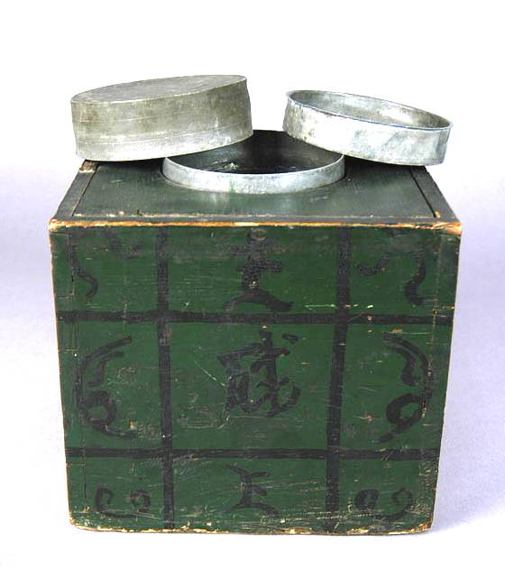 Wood covered tea canister