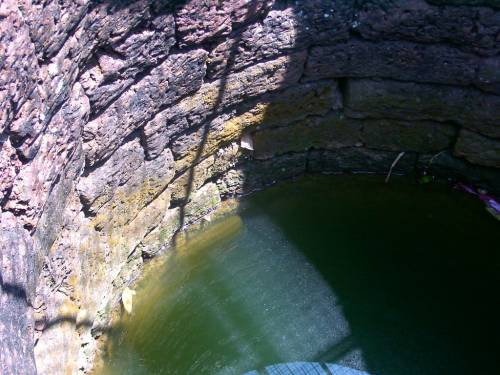 Looking down the Hang Li Poh's well